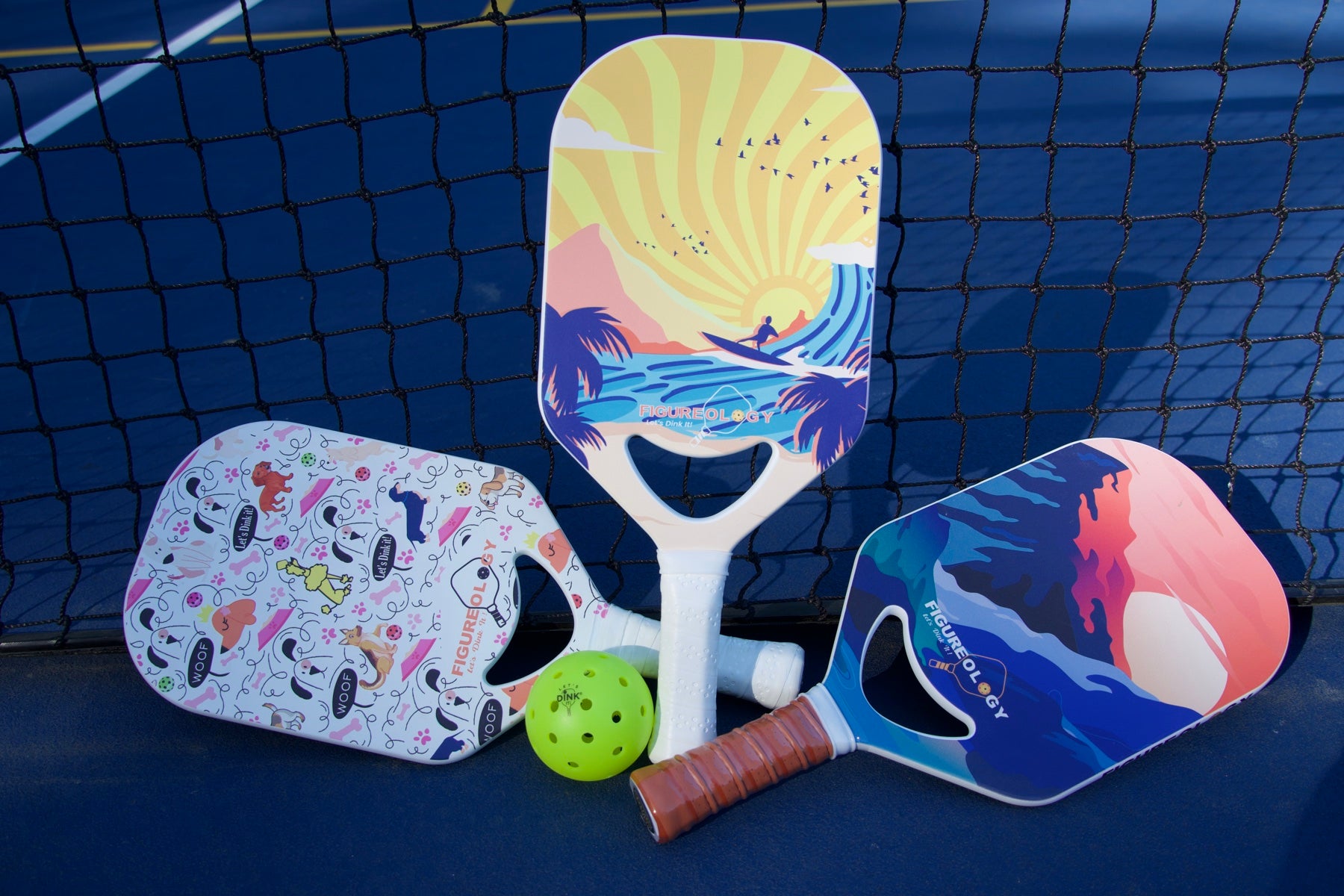 Figureology paddles and pickleball photographed on court